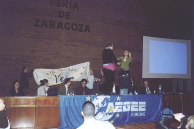 24: Sel, new President of the Dance Working Group, showing her skills with Sena Latif on the chairtable.