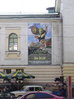 19: Film poster at cinema Patria. Although Moldovan, which is a Romanian dialect, is nowadays the dominant and official language, all movies are still shown in Russian language.