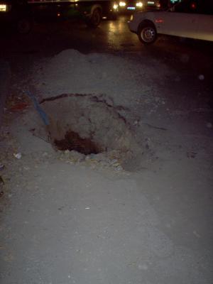 6: Hole in the street