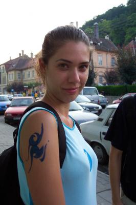 32: ...and Raluca showing her new tatoo.