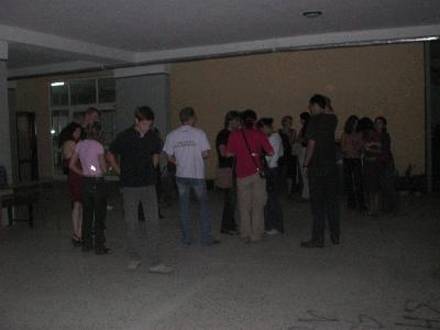 94: Some people gathered together at the Greek Night. We had a party outside the highschool, with Greek food, and all kinds of Greek spirits, and other alcoholic beverages.