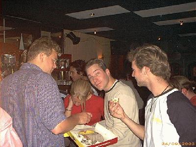 6: Ronald (middle), treating everybody to pie, among whom the photographer, Jesse (right).